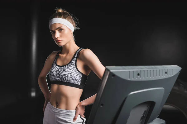 Selective Focus Sportswoman Hands Hips Looking Camera Treadmill — Stock Photo, Image