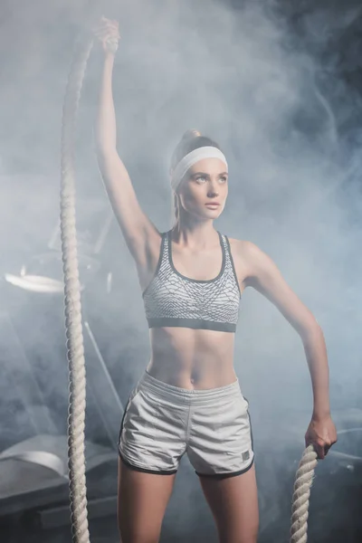 Selective Focus Young Sportswoman Holding Battle Rope Gym Smoke — Stock Photo, Image