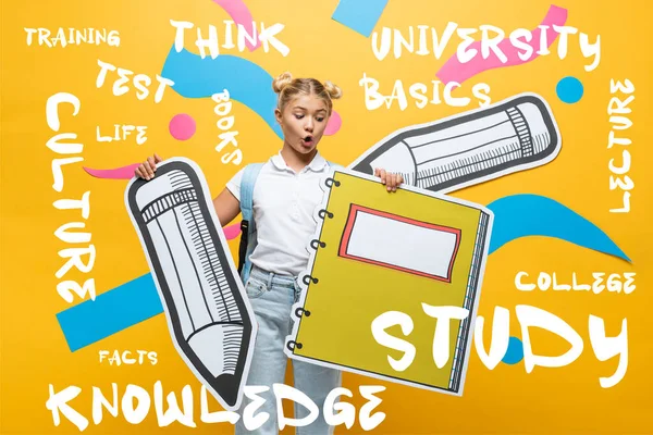 Shocked Schoolchild Holding Paper Notebook Pencil Lettering Yellow — Stock Photo, Image