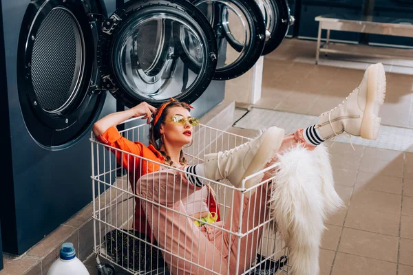 Stylish Woman Sitting Cart Washing Machines Laundromat — Stock Photo, Image