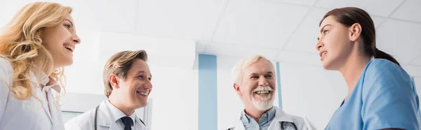 Panoramic Shot Doctors Looking Nurse While Talking Clinic — Stock Photo, Image