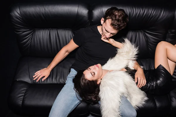 Passionate Brunette Woman White Jacket Touching Boyfriend Chin While Lying — Stock Photo, Image