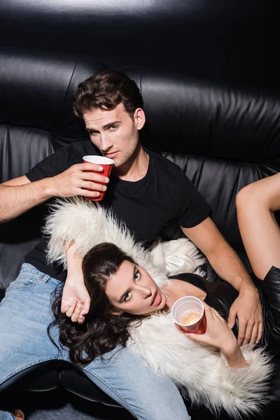 Brunette Woman Hand Hold Plastic Cup Coffee While Lying Man — Stock Photo, Image