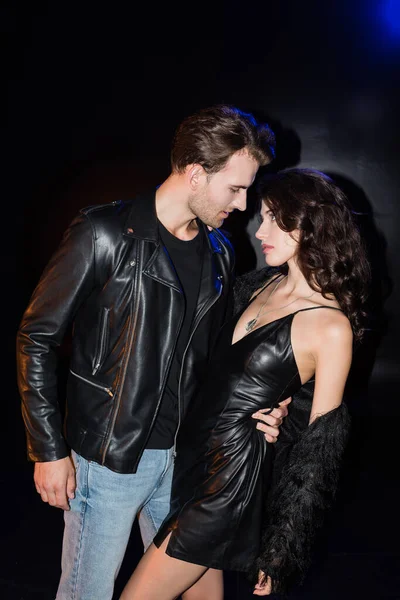 Passionate Boyfriend Embracing Bending Seductive Girlfriend Leather Dress Black — Stock Photo, Image