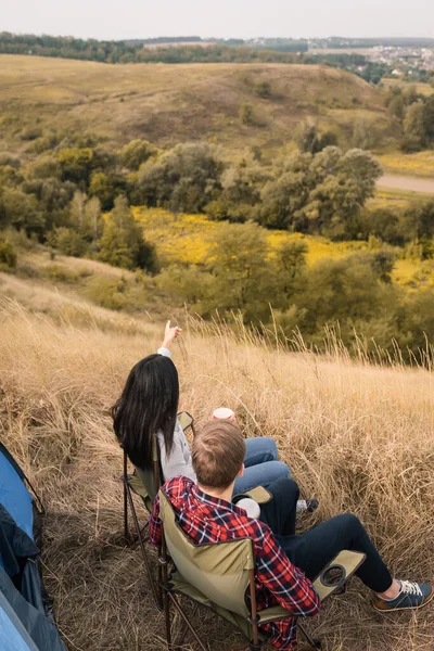 Overhead View Woman Holding Cup Pointing Away Boyfriend Chair Tent — Stock Photo, Image