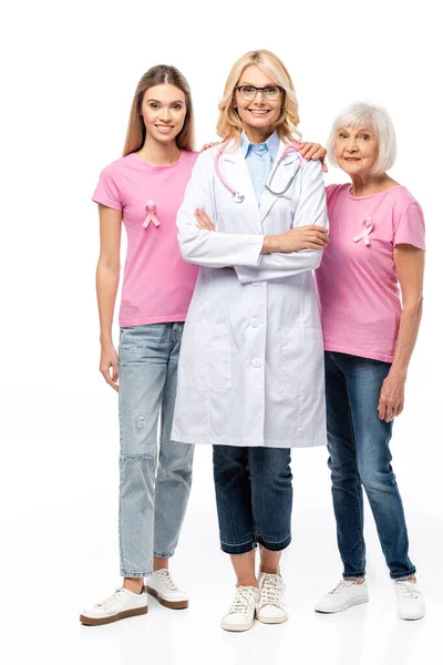 Women Pink Ribbons Shirts Hugging Doctor White Background — Stock Photo, Image