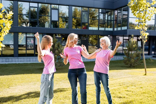 Excited Women Wearing Pink Shirts Ribbons Breast Cancer Awareness — Stock Photo, Image