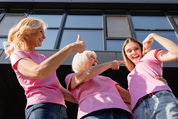 Low Angle View Women Pointing Fingers Sign Breast Cancer Awareness — Stock Photo, Image