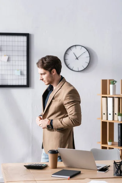 Side View Thoughtful Businessman Unbuttoning Jacket While Standing Workplace Office — Stock Photo, Image