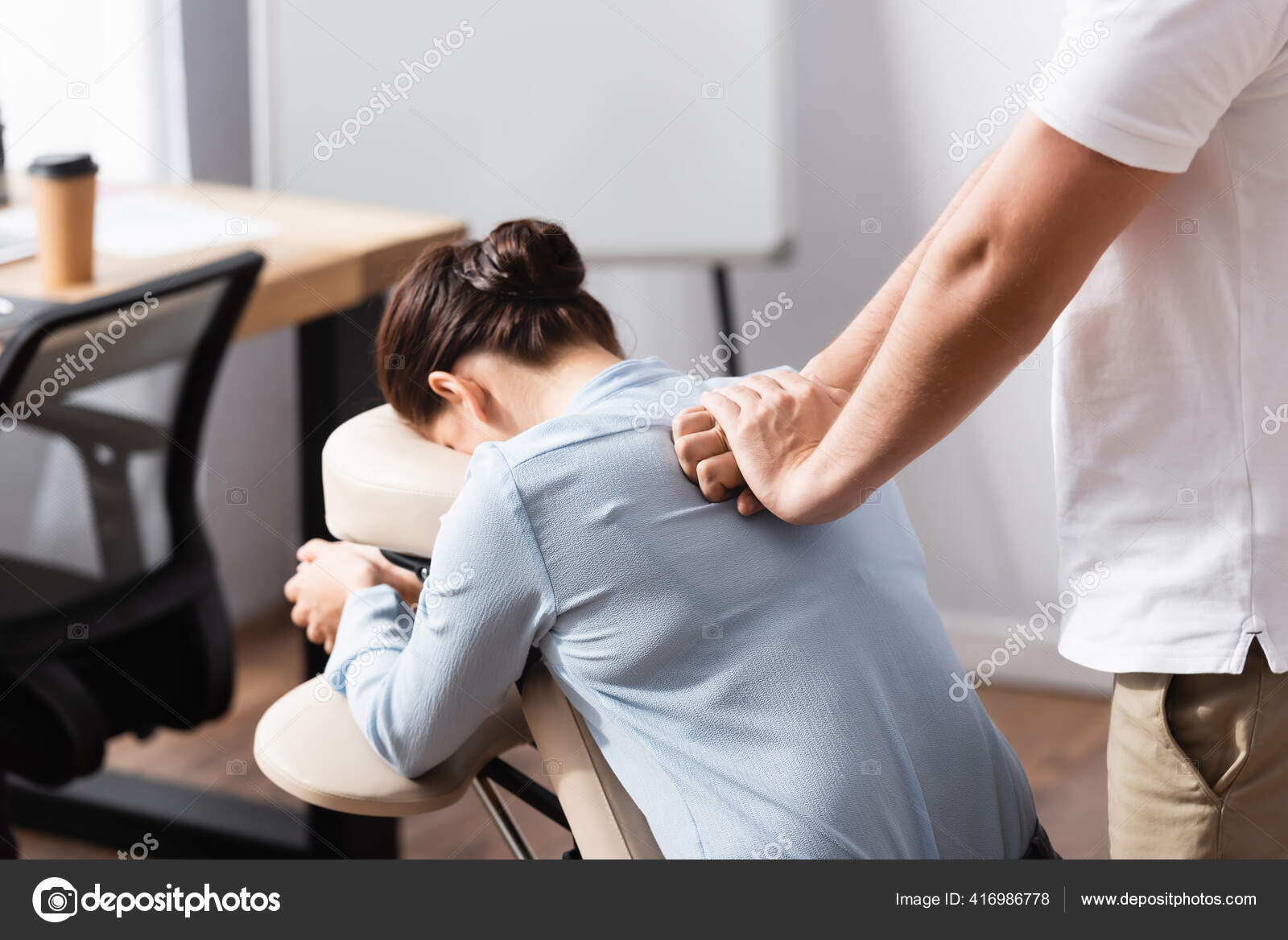 Massage Therapist Massaging Brunette Woman Back Sitting Massage