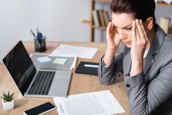 Businesswoman Migraine Looking Away While Sitting Contracts Laptop Table Blurred — Stock Photo, Image