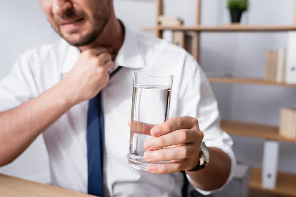 Cropped View Businessman Hand Neck Holding Glass Water While Sitting — Stock Photo, Image