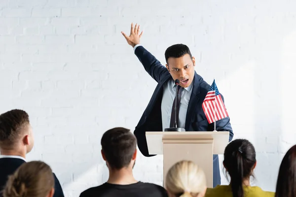 Excited Indian Agitator Gesturing While Talking Voters Conference Hall Blurred — Stock Photo, Image