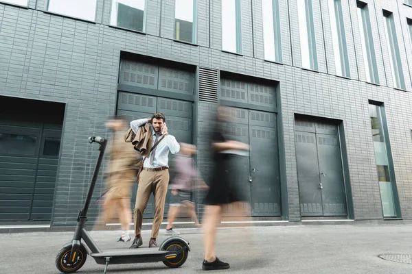 Businessman Suit Talking Smartphone While Standing Scooter People Motion Blur — Stock Photo, Image