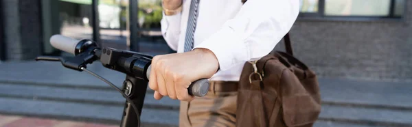 Cropped View Businessman Holding Leather Bag While Standing Scooter Building — Stock Photo, Image