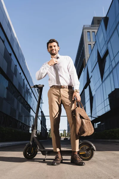 Low Angle View Bearded Businessman Formal Wear Adjusting Tie While — Stock Photo, Image