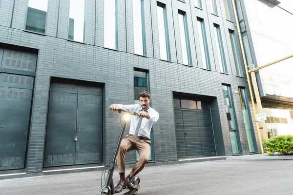 Full Length Businessman Formal Wear Riding Electric Scooter Building — Stock Photo, Image