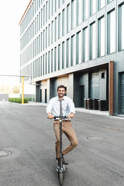 Full Length Happy Businessman Formal Wear Riding Electric Scooter Building — Stock Photo, Image