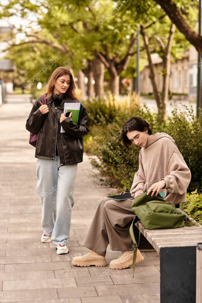 Loving couple shares a tender moment surrounded by lush greenery on a sunny day.