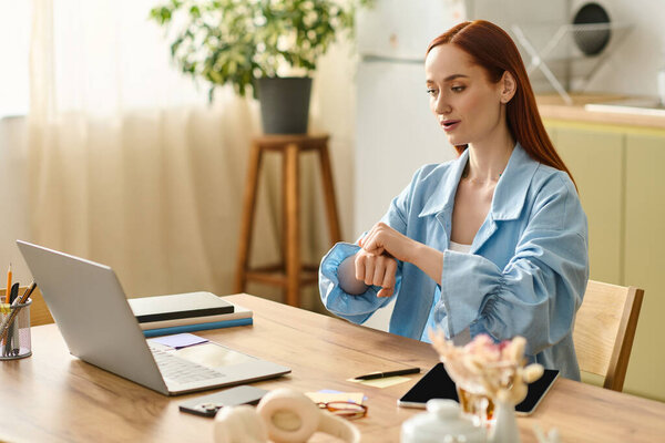 A woman with red hair teaches languages online, using her laptop while working from home.