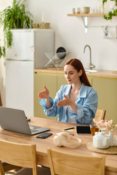 A woman with red hair teaches languages online, fostering an engaging classroom vibe.