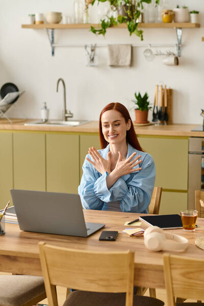 A woman with red hair teaches languages online from her cozy home office, smiling and connecting.