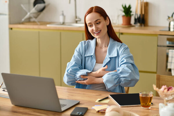 A language teacher with red hair is guiding students online from her home office, using her laptop.