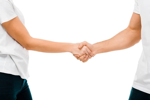 Vue partielle de jeune homme et femme serrant la main isolé sur blanc — Photo de stock