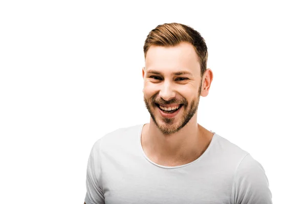 Portrait of handsome bearded young man in white t-shirt smiling at camera isolated on white — Stock Photo