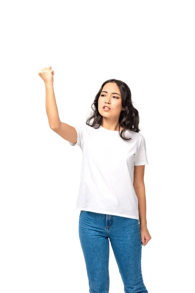 Enojado joven asiático mujer peleando y mostrando levantado puño aislado en blanco - foto de stock
