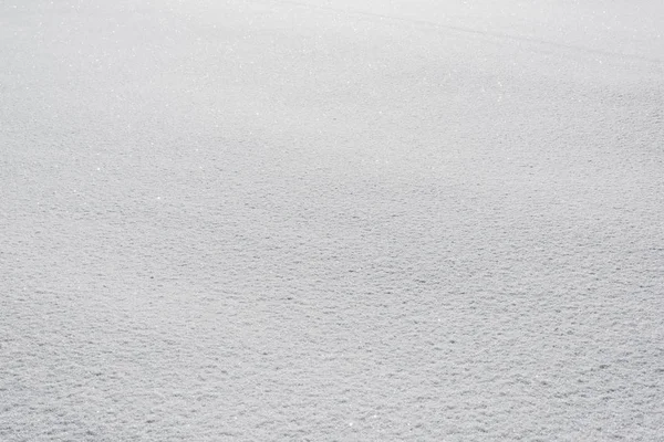 Close up of textured white snow with copy space — Stock Photo