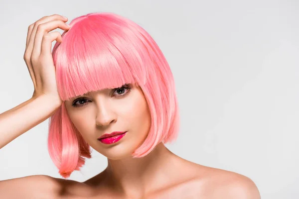 Attractive thoughtful naked girl in pink wig isolated on grey — Stock Photo