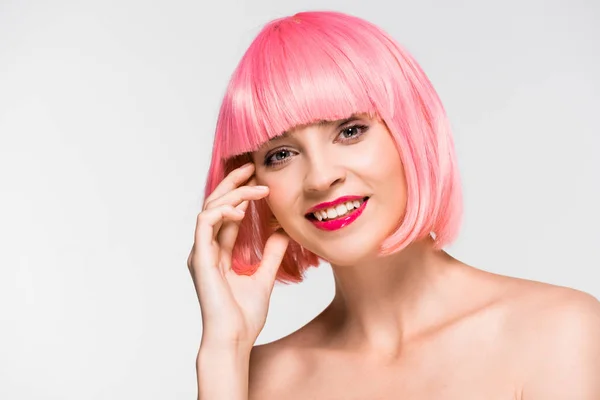 Attractive cheerful naked girl in pink wig isolated on grey — Stock Photo