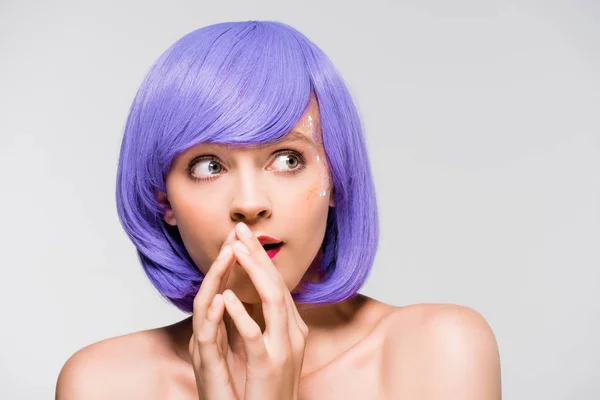 Pretty shocked girl in purple wig isolated on grey — Stock Photo