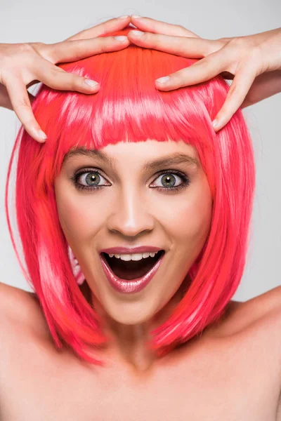 Stylish excited woman in pink wig isolated on grey — Stock Photo