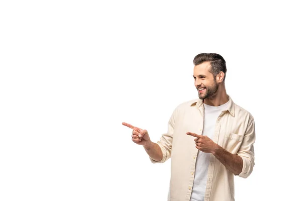 Homem feliz apontando com os dedos isolados em branco com espaço de cópia — Fotografia de Stock