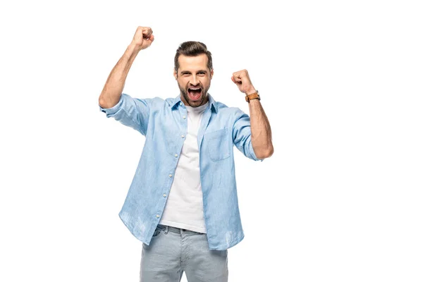 Excitado hombre animando con los puños apretados aislado en blanco - foto de stock