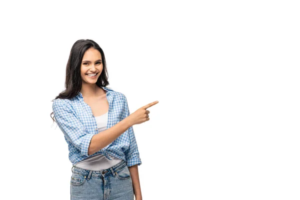 Menina feliz apontando com o dedo no espaço cópia isolado no branco — Fotografia de Stock