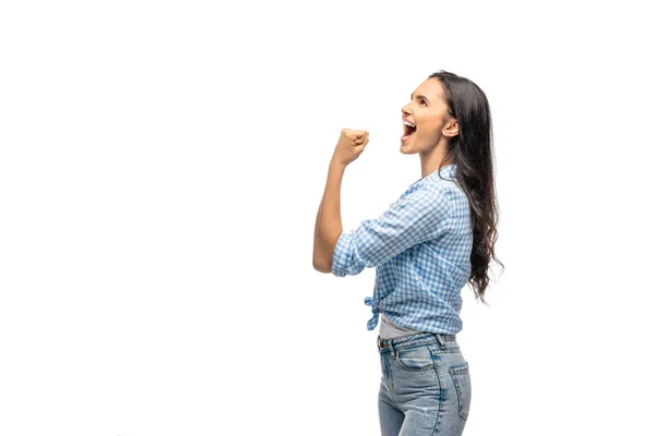 Bela menina animada torcendo com o punho cerrado isolado no branco — Fotografia de Stock