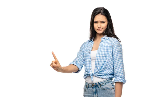 Chica escéptica señalando con el dedo aislado en blanco con espacio de copia - foto de stock