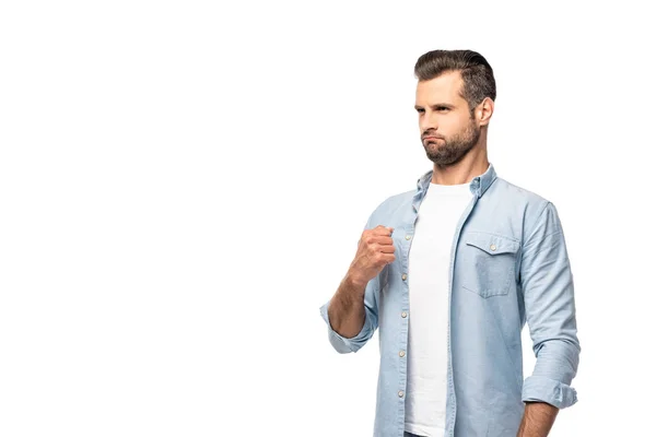 Selbstbewusster Mann mit geballter Faust auf weißem Hintergrund mit Kopierraum — Stockfoto