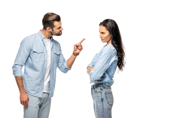 Angry man pointing with finger at young woman Isolated On White — Stock Photo
