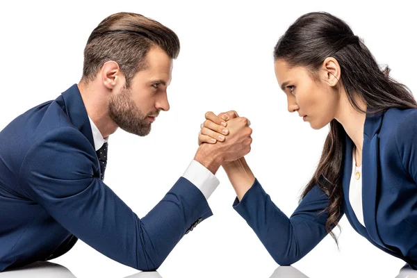 Businessman and businesswoman in formal wear arm wrestling isolated on white — Stock Photo