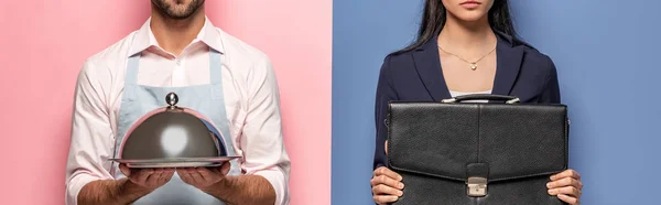 Panoramic shot of man in apron with Serving Tray and businesswoman with briefcase on blue and pink — Stock Photo