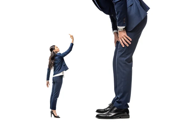 Small businesswoman showing middle finger at big businessman Isolated On White — Stock Photo