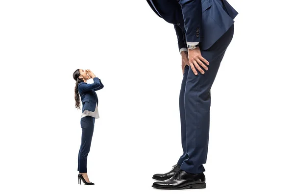 Small businesswoman shouting at big businessman Isolated On White — Stock Photo