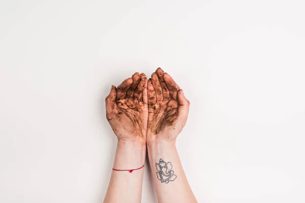 Cropped view of woman with dirty hands on white — Stock Photo