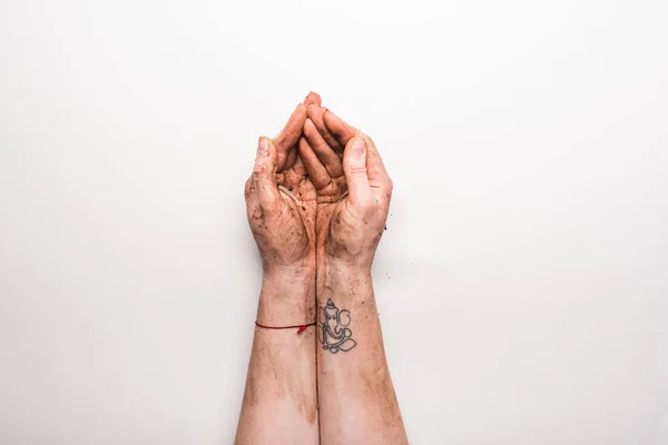 Vue recadrée de la femme avec les mains sales sur blanc — Photo de stock