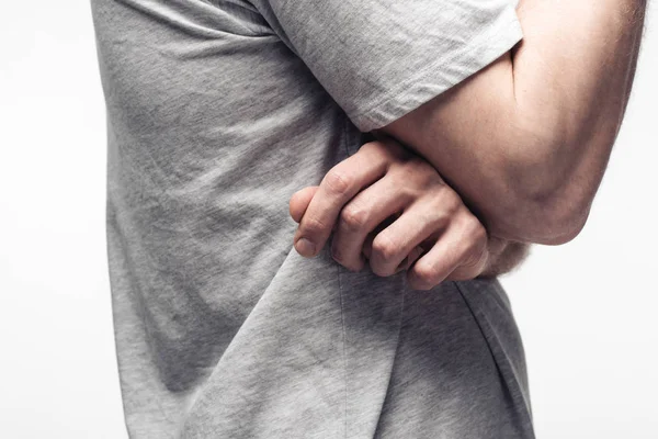 Partial view of man in waiting pose isolated on grey, human emotion and expression concept — Stock Photo