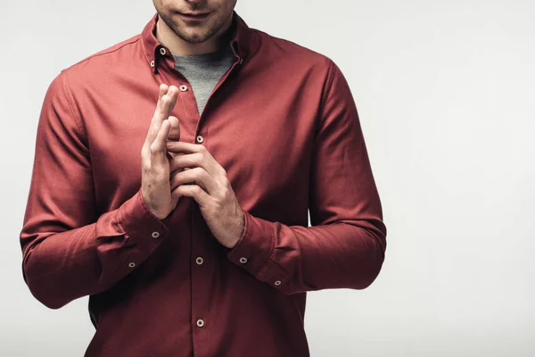 Foto ritagliata dell'uomo in camicia marrone gesticolare con le mani isolate sul grigio, emozione umana e concetto di espressione — Foto stock